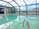 Inviting screened pool with water views at 2460 W Marion Ave, Punta Gorda, FL 33950