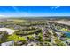 Aerial view of a beautiful community with houses and lakes at 2915 126Th E Ter, Parrish, FL 34219