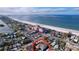 Aerial view of a house near the beach and the ocean at 3505 Casablanca Ave, St Pete Beach, FL 33706