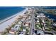 Aerial view of beachfront property and coastal area at 3505 Casablanca Ave, St Pete Beach, FL 33706