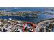 Aerial view of a house near a waterway, showing the surrounding neighborhood at 3505 Casablanca Ave, St Pete Beach, FL 33706
