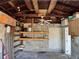 View of the detached garage featuring built-in shelving, a ceiling fan, and great storage potential at 3505 Casablanca Ave, St Pete Beach, FL 33706