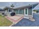 Brick paved patio with a built-in grill, adjacent to the house at 3505 Casablanca Ave, St Pete Beach, FL 33706