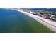 Aerial shot of coastline, showcasing beach and ocean view at 3505 Casablanca Ave, St Pete Beach, FL 33706