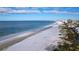 Beachfront property with white sand and ocean view at 3505 Casablanca Ave, St Pete Beach, FL 33706