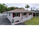 Charming single-story home with a carport and well-maintained lawn at 3505 Casablanca Ave, St Pete Beach, FL 33706