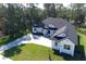 Stunning aerial view of a two-story home with a large yard at 4675 Hickory Oak Dr, Brooksville, FL 34601