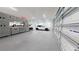 Finished garage with ample storage and epoxy flooring at 4675 Hickory Oak Dr, Brooksville, FL 34601
