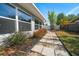 Pathway through backyard landscaping to a fenced area at 13632 Imperial Groves S Dr, Largo, FL 33774