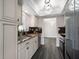 Updated kitchen features granite countertops and modern cabinetry at 13632 Imperial Groves S Dr, Largo, FL 33774