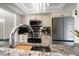 Modern kitchen with granite countertops and stainless steel appliances at 13632 Imperial Groves S Dr, Largo, FL 33774