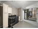 Laundry room with washer, dryer, cabinets and utility sink at 13632 Imperial Groves S Dr, Largo, FL 33774