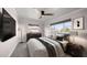 Serene main bedroom featuring ample natural light, a neutral color palette, and comfortable furnishings at 13632 Imperial Groves S Dr, Largo, FL 33774