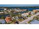 Waterfront home with private dock and lush landscaping at 17726 Long Point Dr, Redington Shores, FL 33708
