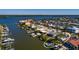 Waterfront home with private dock and lush landscaping at 17726 Long Point Dr, Redington Shores, FL 33708