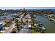 Waterfront home with private dock and lush landscaping at 17726 Long Point Dr, Redington Shores, FL 33708