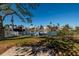 Private backyard oasis with a boat dock and canal views at 17726 Long Point Dr, Redington Shores, FL 33708