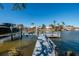Private dock with lift and access to the waterway at 17726 Long Point Dr, Redington Shores, FL 33708