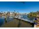 Private backyard dock with lift and waterfront access at 17726 Long Point Dr, Redington Shores, FL 33708