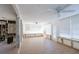 Under construction living area with new flooring and updated windows at 17726 Long Point Dr, Redington Shores, FL 33708
