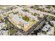 Aerial view of apartment complex with pool and tennis court at 1900 68Th N St # 301, St Petersburg, FL 33710