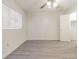 Spacious bedroom with ceiling fan and laminate flooring at 1900 68Th N St # 301, St Petersburg, FL 33710