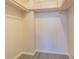 Large walk-in closet with double hanging rods and shelving at 1900 68Th N St # 301, St Petersburg, FL 33710