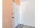 Inviting condo entry with a white door and a patterned rug at 1900 68Th N St # 301, St Petersburg, FL 33710
