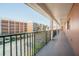 Exterior hallway with view of parking lot and building at 1900 68Th N St # 301, St Petersburg, FL 33710
