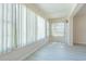Sunroom with abundant natural light and window blinds at 1900 68Th N St # 301, St Petersburg, FL 33710