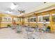 Community common area with tables and chairs at 2447 Ecuadorian Way # 11, Clearwater, FL 33763