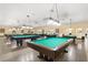 Community game room with multiple billiard tables at 2447 Ecuadorian Way # 11, Clearwater, FL 33763