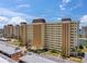 Aerial view of a high-rise building with parking at 4575 Cove Cir # 202, St Petersburg, FL 33708
