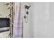 Simple bathroom with white tile and a modern shower fixture at 4575 Cove Cir # 202, St Petersburg, FL 33708