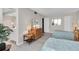 Guest bedroom with twin beds, dresser, and ensuite bathroom access at 4575 Cove Cir # 202, St Petersburg, FL 33708