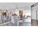 Elegant dining room with mirrored walls and a glass dining table at 4575 Cove Cir # 202, St Petersburg, FL 33708