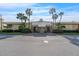 Building exterior with palm trees and parking at 4575 Cove Cir # 202, St Petersburg, FL 33708