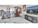 Living room with TV, fireplace, and dining area at 4575 Cove Cir # 202, St Petersburg, FL 33708