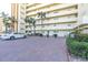 Brick-paved parking area with landscaping at 4575 Cove Cir # 202, St Petersburg, FL 33708