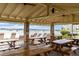 Waterfront picnic tables under covered pavilion at 4575 Cove Cir # 202, St Petersburg, FL 33708