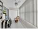 Relaxing sunroom with seating and large windows, perfect for enjoying natural light at 4575 Cove Cir # 202, St Petersburg, FL 33708