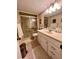 Bathroom with a shower, toilet and vanity with drawers at 4660 Marine Pkwy # 202, New Port Richey, FL 34652