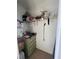Well-lit storage closet with shelving and drawers for ample storage at 4660 Marine Pkwy # 202, New Port Richey, FL 34652