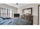 Main bedroom with dresser and large bed at 4805 Sunnybrook Dr # 21, New Port Richey, FL 34653