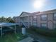 Two-story condo building with parking and landscaping at 4805 Sunnybrook Dr # 21, New Port Richey, FL 34653