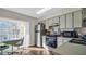 Galley kitchen with stainless steel appliances at 4805 Sunnybrook Dr # 21, New Port Richey, FL 34653