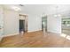 Dining room with hardwood floors and views to kitchen and living room at 5825 1/2 S 5Th St, Tampa, FL 33611