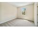 Bright bedroom with large window and neutral decor at 5825 1/2 S 5Th St, Tampa, FL 33611