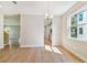 Bright dining room with hardwood floors and chandelier at 5825 1/2 S 5Th St, Tampa, FL 33611