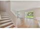 Modern staircase with light wood and white risers at 5825 1/2 S 5Th St, Tampa, FL 33611
